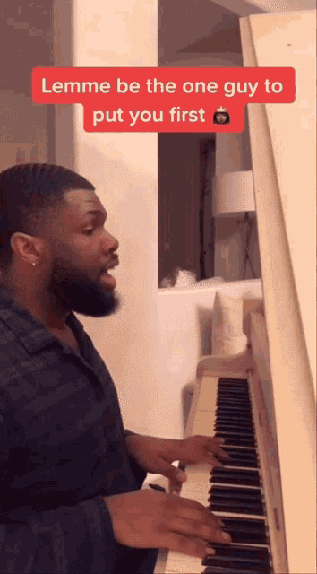 a man is playing a piano with a caption that says " lemme be the one guy to put you first "