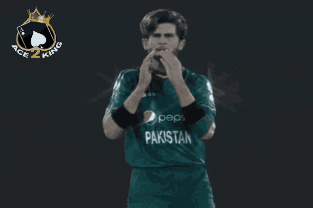 a man in a pepsi pakistan jersey with wings