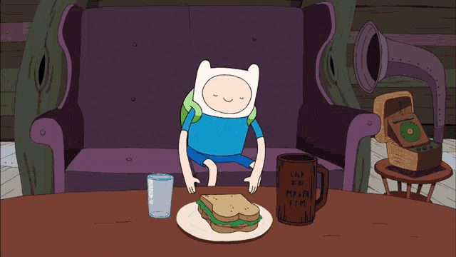 a cartoon character sitting on a couch eating a hot dog next to a mug that says lnp kp mlm tim