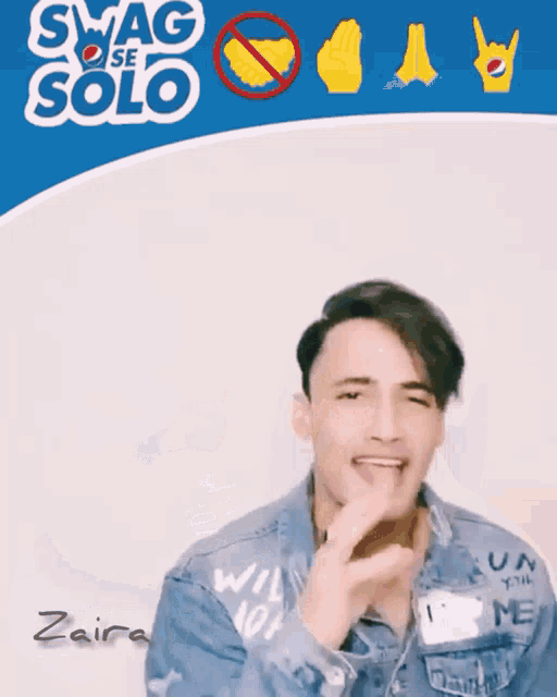 a man in a denim jacket is standing in front of a sign that says swag solo