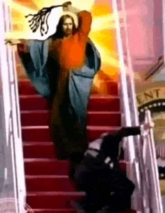 a man in a blue robe is walking down red stairs