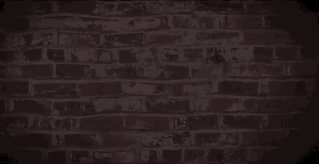 a neon sign that says oh yeah on a brick wall
