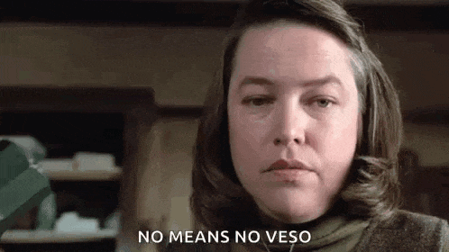 a close up of a woman 's face with the words `` no means no veso '' written next to her .