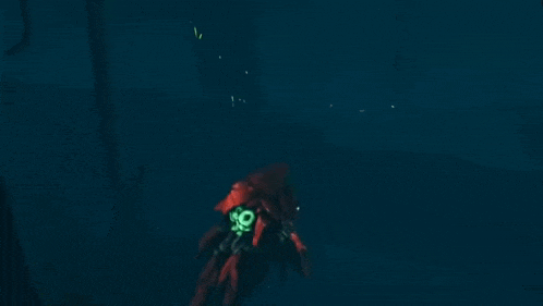 a glow in the dark squid is swimming in the ocean