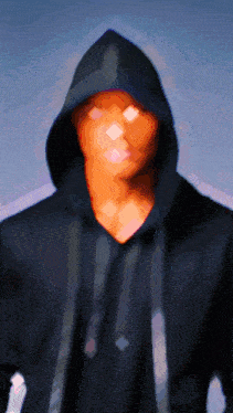 a blurry picture of a man wearing a hooded jacket