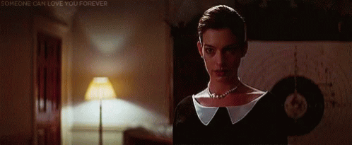 Anne Hathaway Oops GIF - Anne Hathaway Oops The Dark Knight Rises GIFs