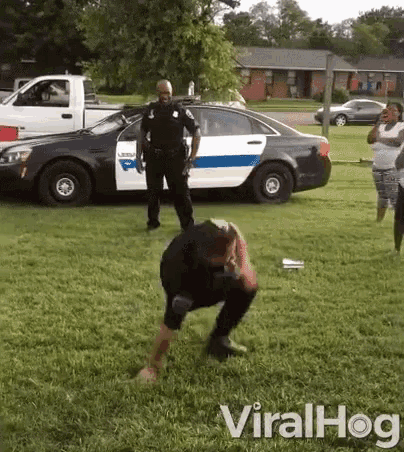Breakdancing Cop GIF - Breakdancing Dancing Cop GIFs
