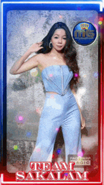 a woman in a blue jumpsuit with the name sakalam on the bottom