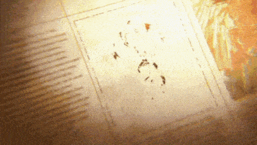 a close up of a page of a book with a picture of a person on it