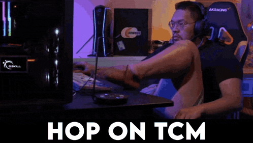 a man wearing headphones sits at a desk with his legs crossed and the words hop on tcm below him