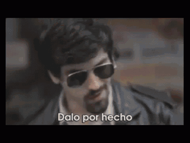 a man wearing sunglasses says dalo por hecho