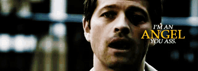 a close up of a man 's face with the words " i 'm an angel you ass " above him