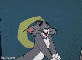 tom from tom and jerry is laughing in front of a squirrel