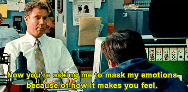 a man in a white shirt and tie is talking to another man in front of a computer screen .