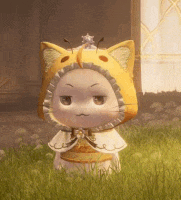 a cartoon cat is wearing a yellow cat hat and a crown .