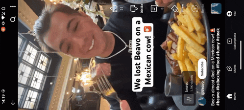 a phone screen shows a man holding a fork and a plate of food