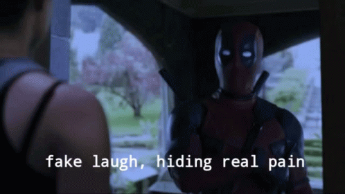Deadpool Fake Laugh GIF - Deadpool Fake Laugh Hiding Real Pain GIFs