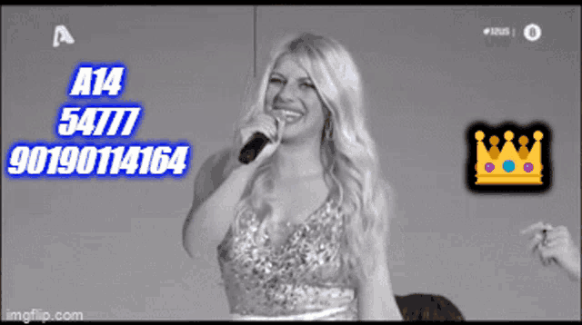 a woman singing into a microphone with the numbers a14 5477 and 90190114164