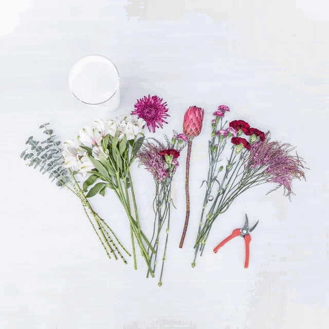 a box of flowers from enjoy flowers with a gift card