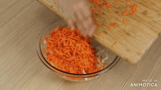 a person is cutting an onion on a wooden cutting board made in animotica