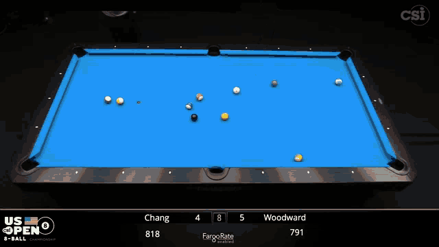 a pool table with a blue cloth and a person playing pool