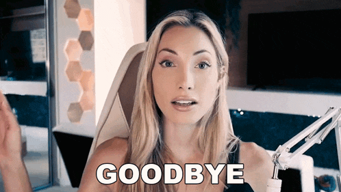 a woman sitting in a chair with the words goodbye written on her face