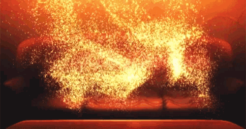 a bunch of sparks are coming out of the oven