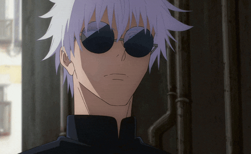 a close up of a man wearing sunglasses and a black shirt