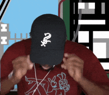a man wearing a hat that says ' chicago ' on it
