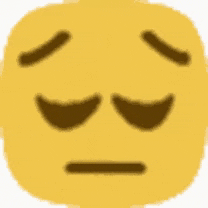 a close up of a yellow smiley face with a brown stripe on it .