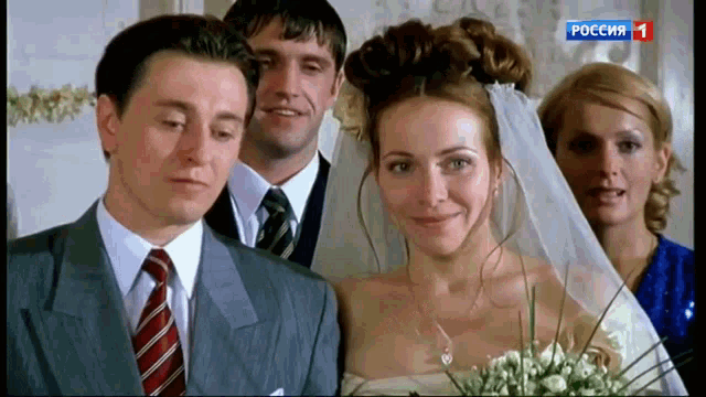 a bride and groom are posing for a picture in front of a screen that says " poccia 1 "