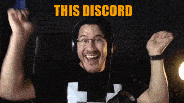 a man wearing headphones and a t-shirt that says this discord is celebrating