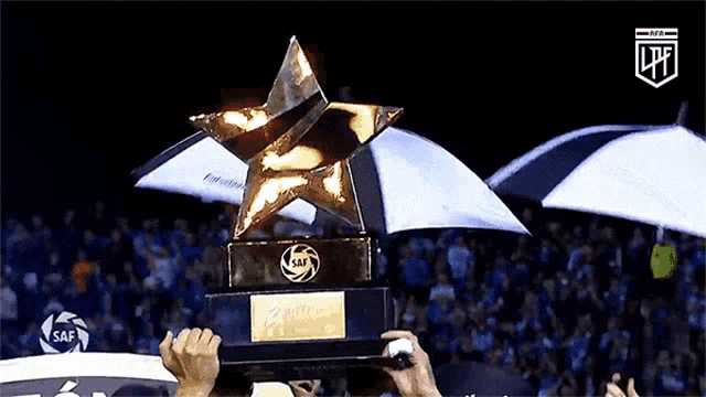 a trophy with a star on top of it that says saf