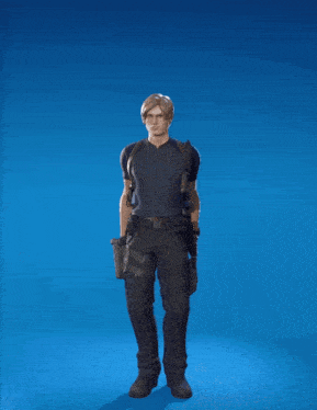a man in a black shirt and black pants stands with his arms in the air