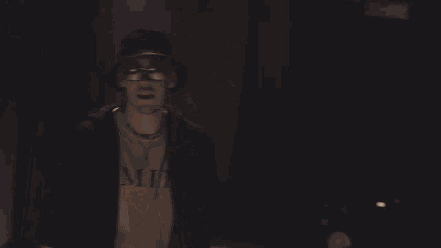 a man wearing a hat with the words so icy nihao on the bottom