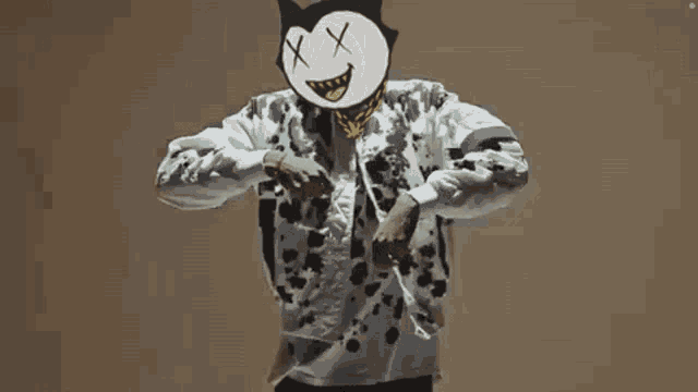 a person with a cartoon face with x 's on it 's eyes