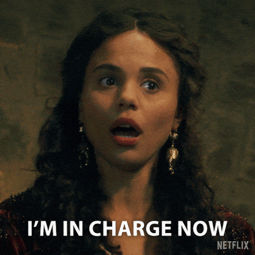a woman says i 'm in charge now with a netflix logo behind her