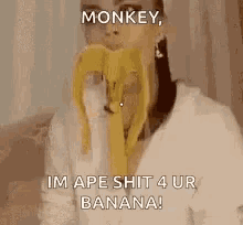 a woman is eating a banana with the words monkey im ape shit 4 ur banana .