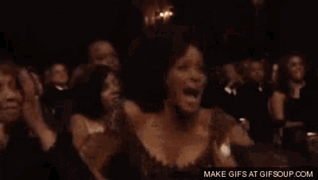 a blurred image of a woman with the words make gifs at gifsoup.com below her