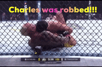 a boxing match with the words " charles was robbed " on the top