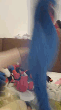 a bunch of stuffed animals are laying on a table