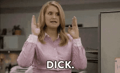 a woman in a pink shirt is making a face and saying `` dick '' .