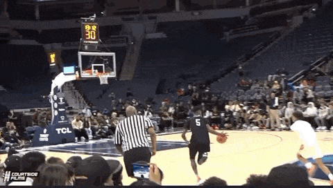 a basketball game is being played and the score is 30 to 30
