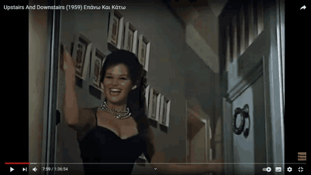 a video of a woman is titled upstairs and downstairs 1959