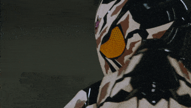 a close up of a person 's face with a camouflage pattern