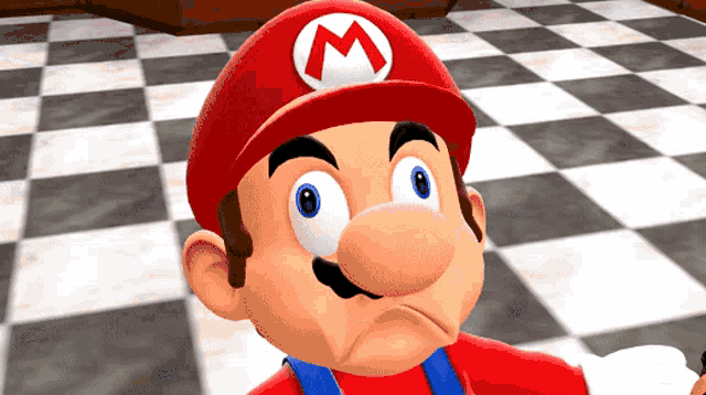 a close up of a cartoon character with a red hat with a white m on it