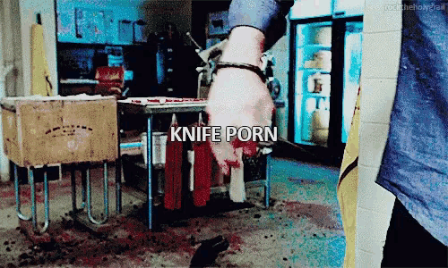 a person holding a knife with the word knife porn written below it