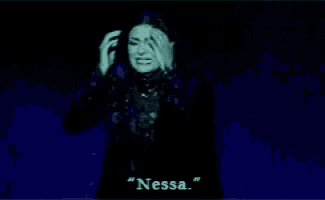 a woman singing a song with the words " nessa " in the corner