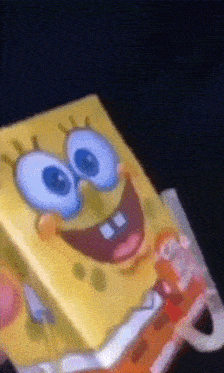 a close up of a spongebob squarepants box with a handle