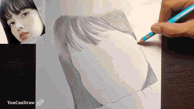 a drawing of a woman 's face is being drawn with a blue colored pencil by youcandraw